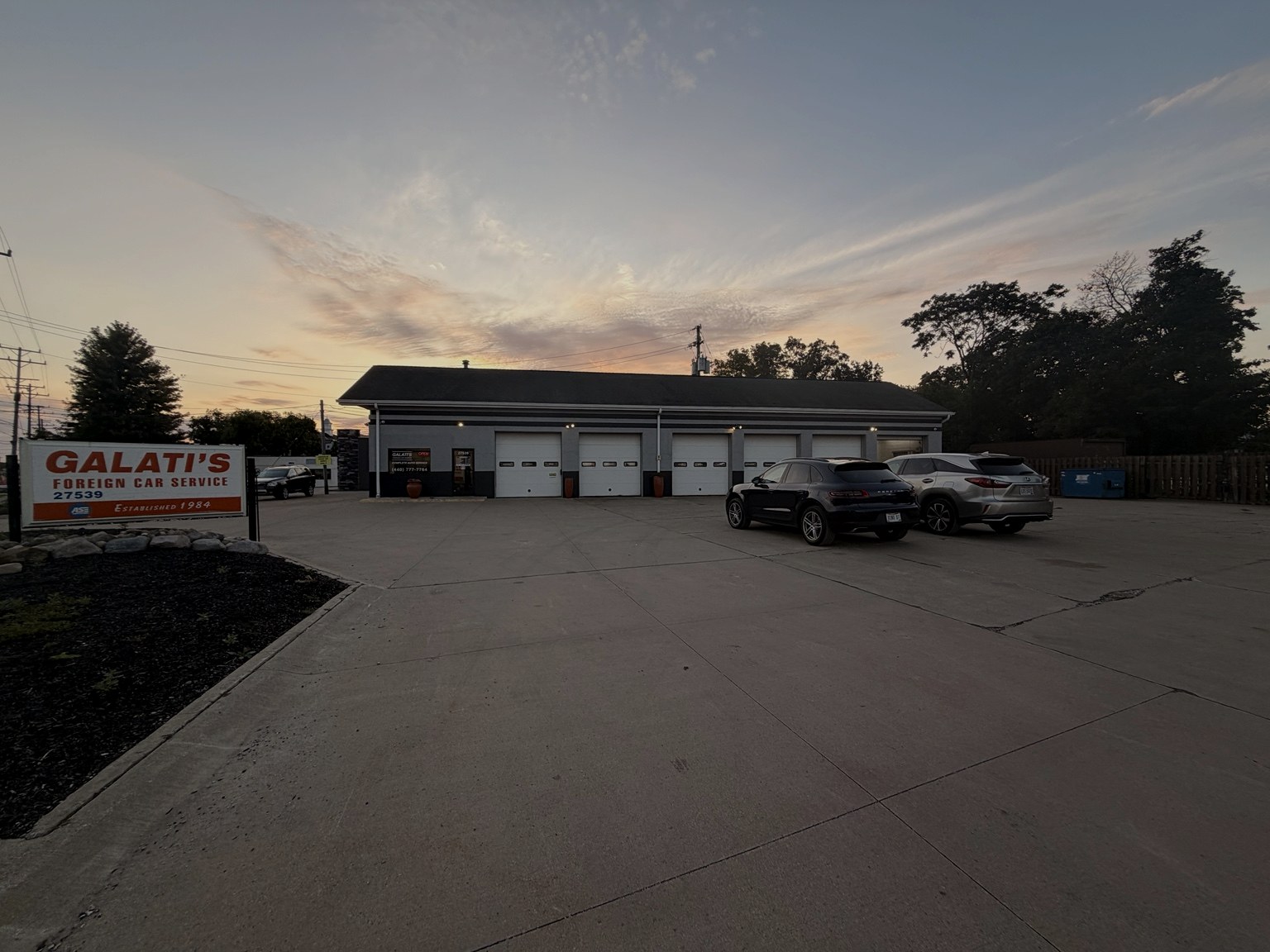 Galati's Foreign Car Service exterior and signage at dusk on Lorain Road, North Olmsted